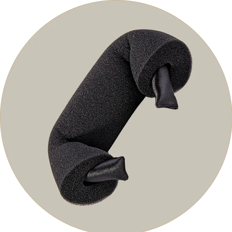 Black hair scrunchie on a light gray background