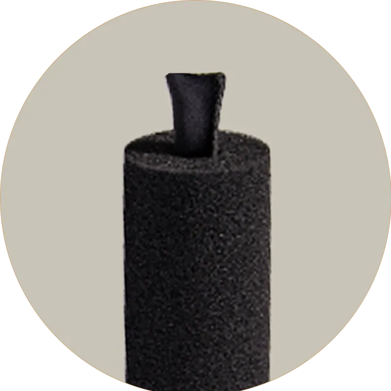 Black foam roller on a light gray background