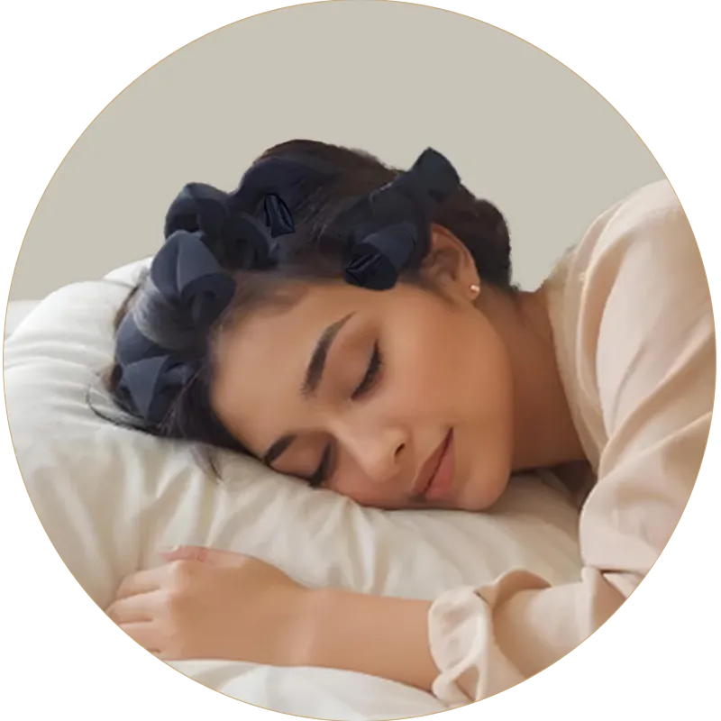 Woman sleeping with dark hair accessories on a light background